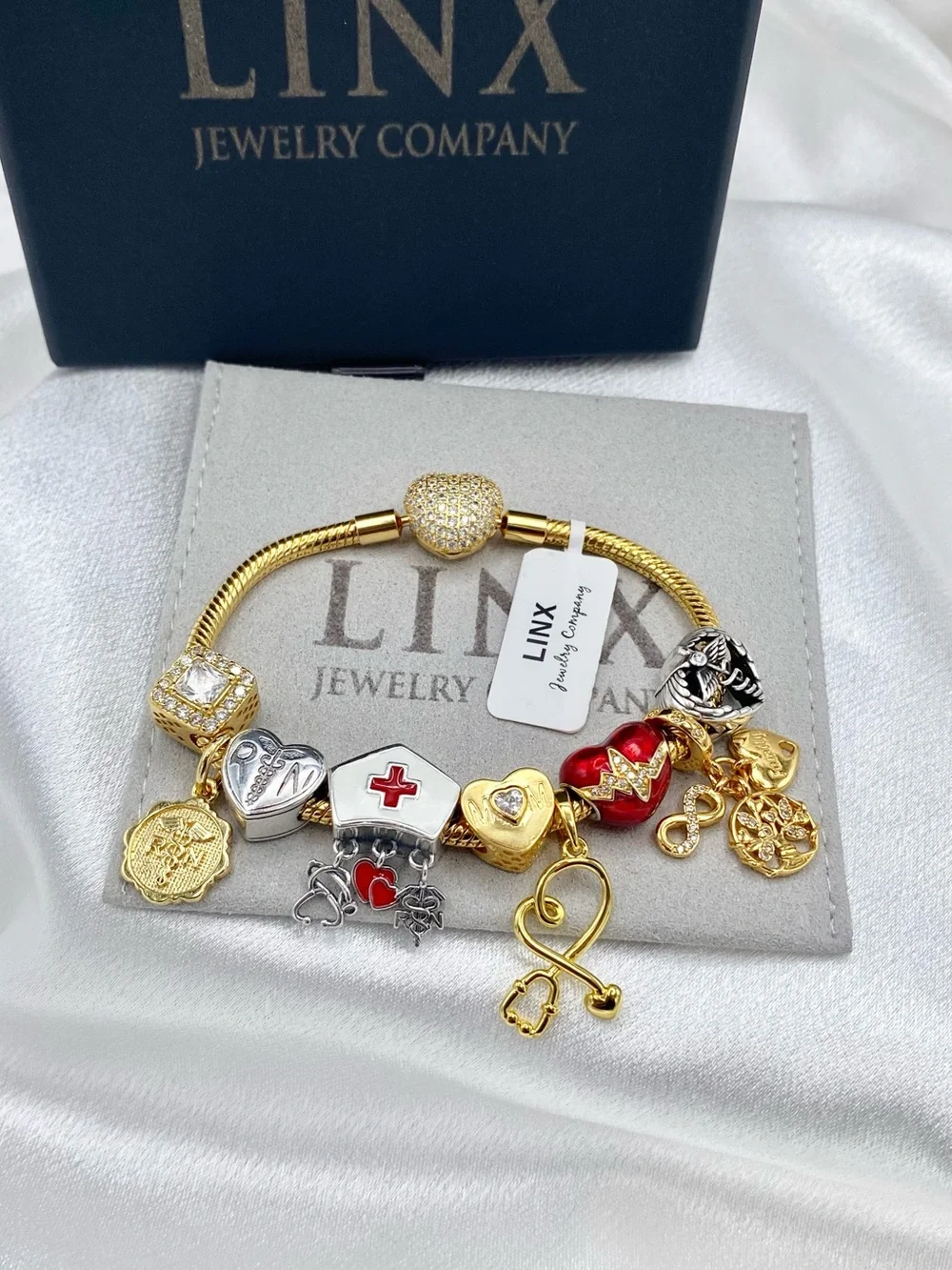 Linx Gold Snake Chain Charm Bracelet with Registered Nurse, Mom & Family Charms